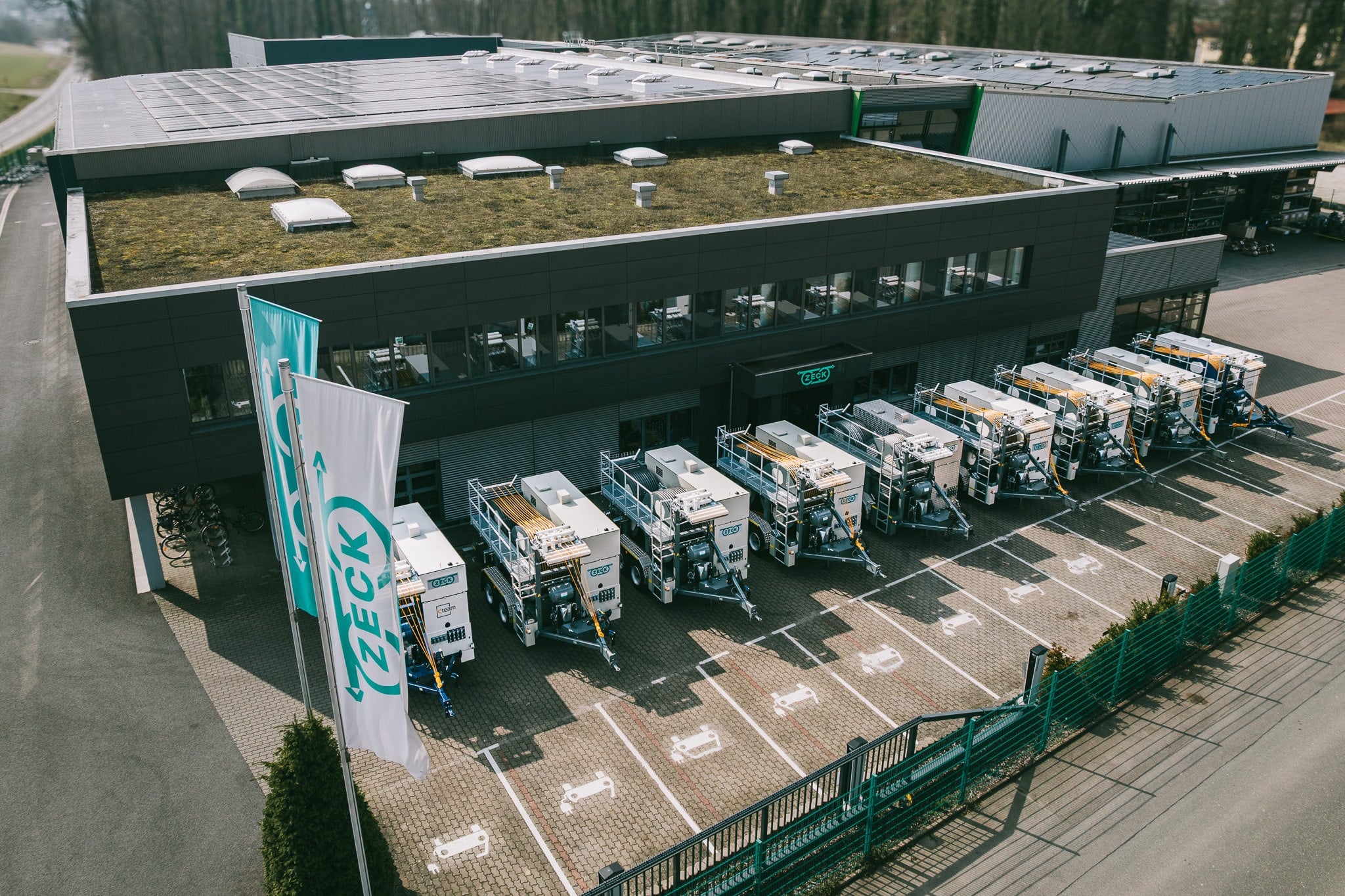 The ZECK GmbH plant in Scheßlitz-Burgellern with a row of ZECK machines in the yard